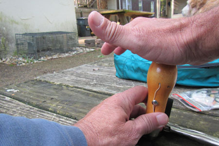 hitting awl with heel of hand