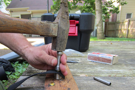 striker insert handle with a hammer