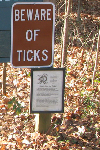 sign warning of ticks